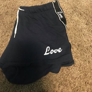These are blue and white LOVE forever 12 shorts